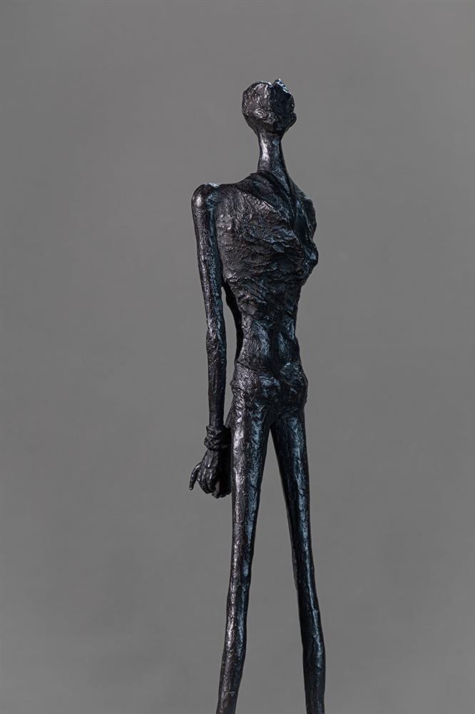 bahman dadkhah sculpure of a figure with tied hands