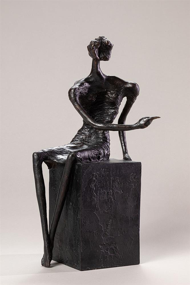 bahman dadkhah sculpture of a sitting figure pointing right