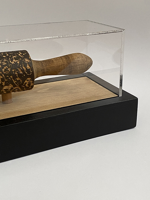 one of koosha moossavi's printing tools, a carved out rolling pin