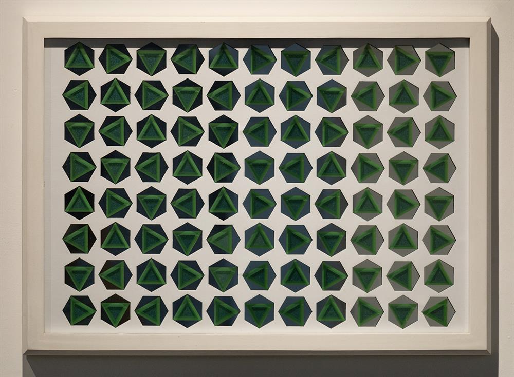 artwork by masoud majzoobi, cut out glass with geometric patterns
